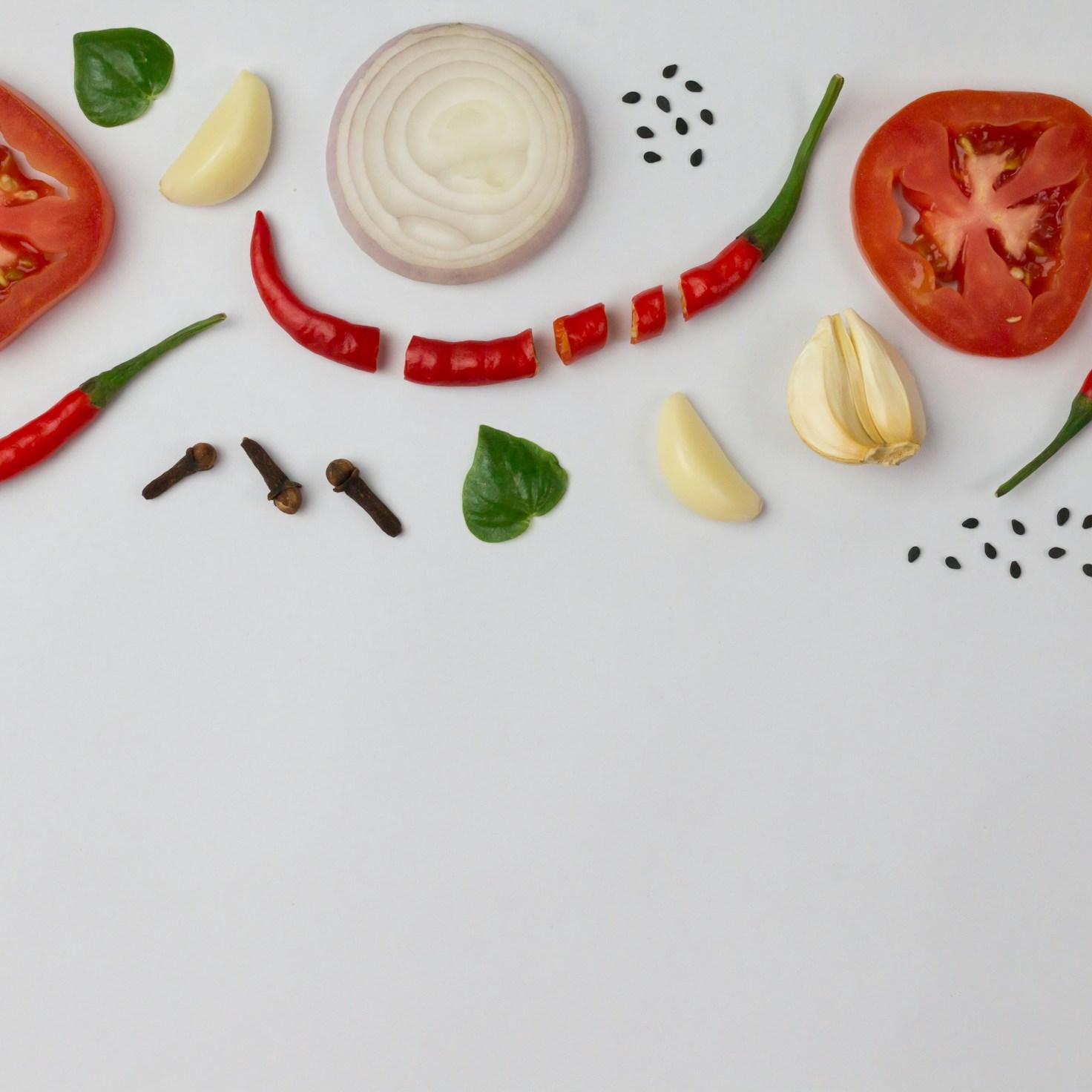 Diverse group of community members sharing a meal together, showcasing the social bonds formed through collaborative cooking